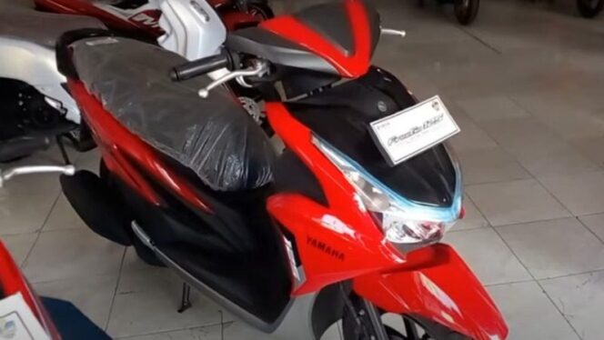 
					Yahama FreeGo 125 warna merah menjadikan sepeda motor ini semakin menawan. 